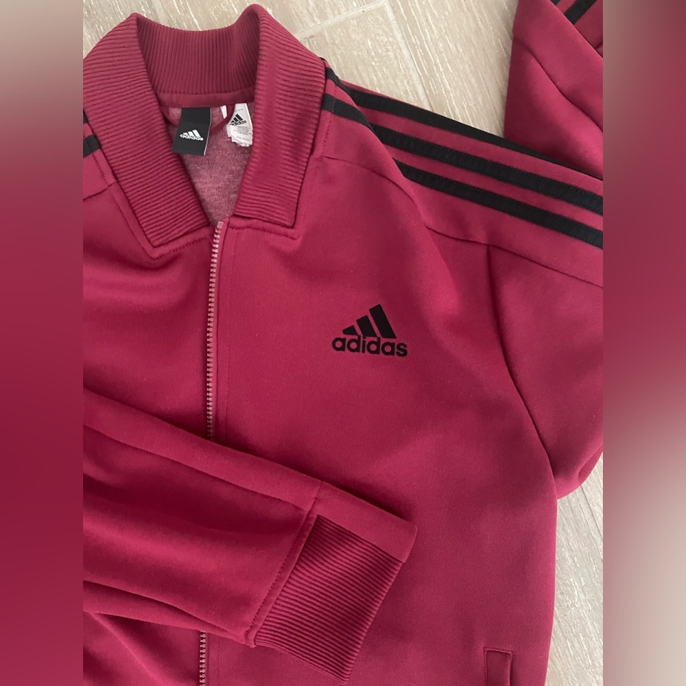 Adidas 2 piece Track Suit. Size Large jacket. Size Medium Pants.